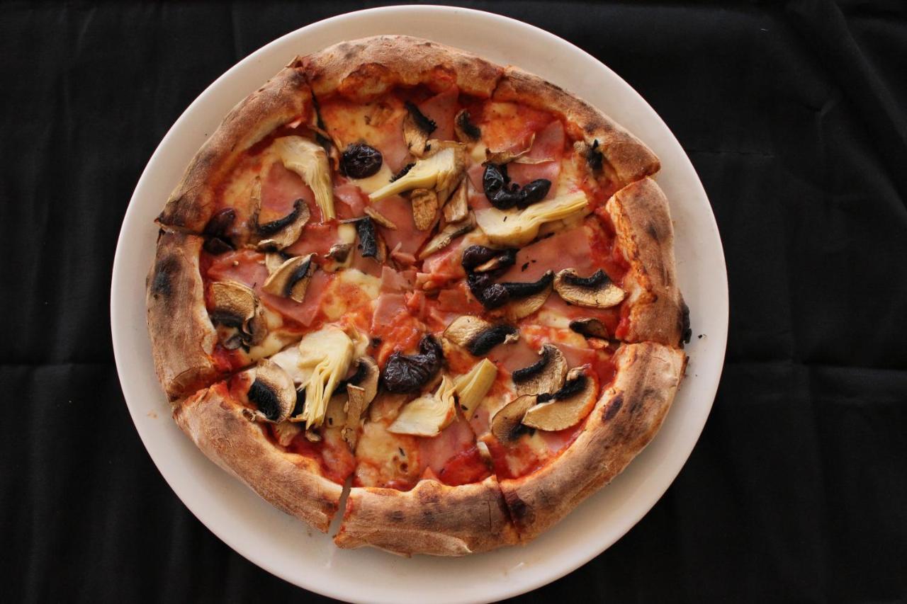Lighthouse Golf & Spa Hotel Balchik Extérieur photo Pizza